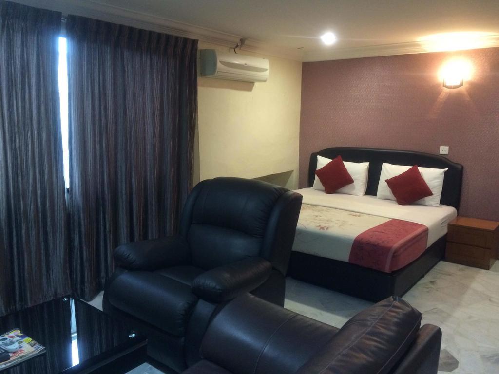 City Star Hotel Kulai Room photo